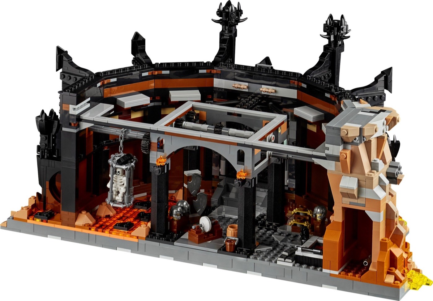 Ground level of the LEGO Barad-dûr 10333 showing the orange magma pools, the hanging cage with a skeleton and the orc forge