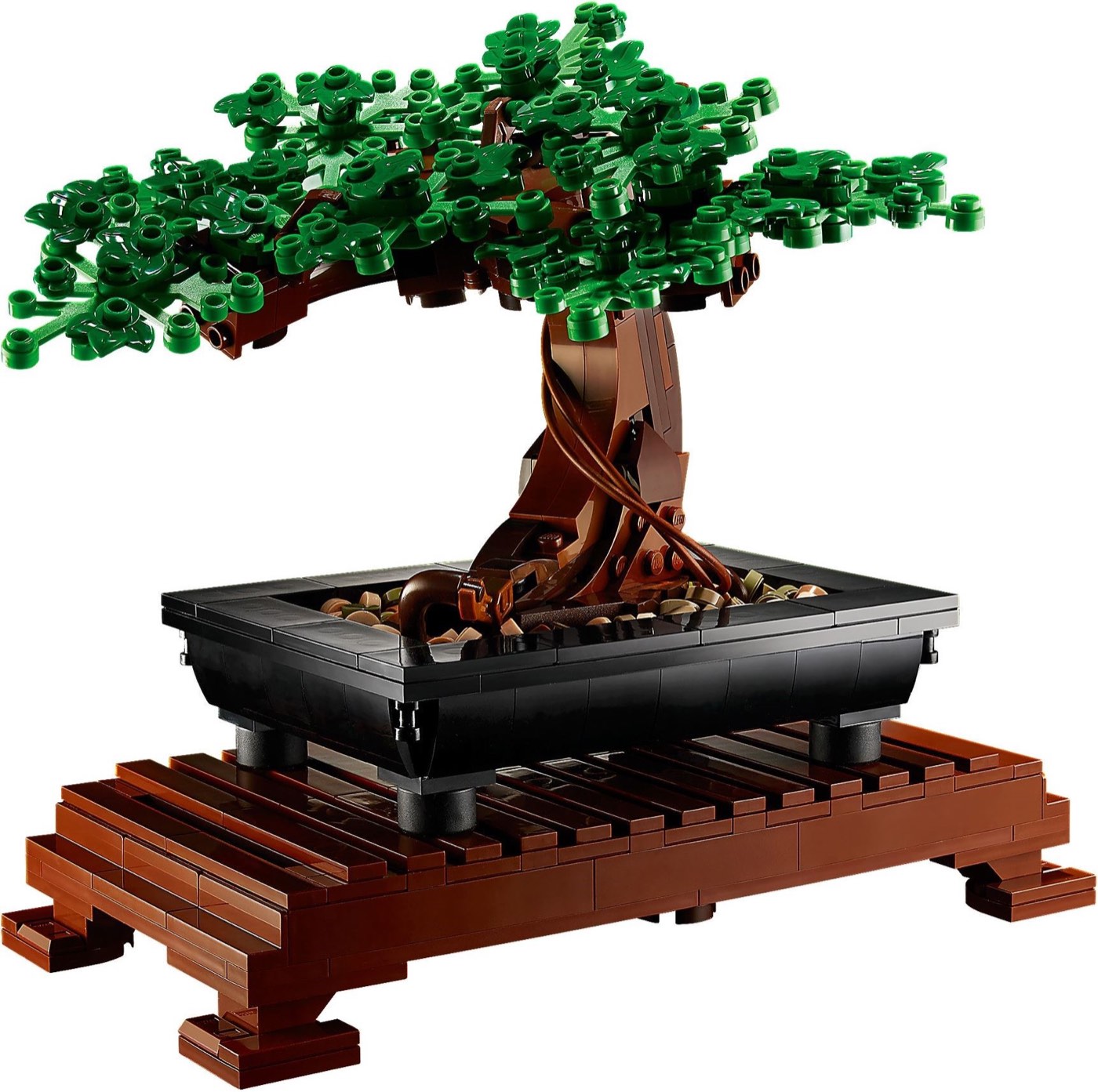The built LEGO Bonsai Tree 10281 with green foliage on its wooden stand