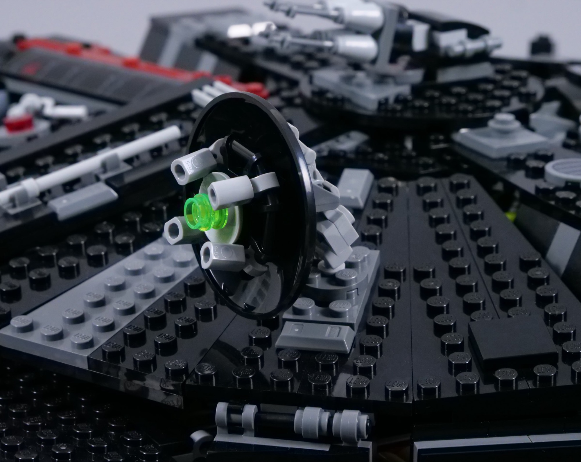 Circular red superlaser dish mounted on top of LEGO Dark Falcon 75389