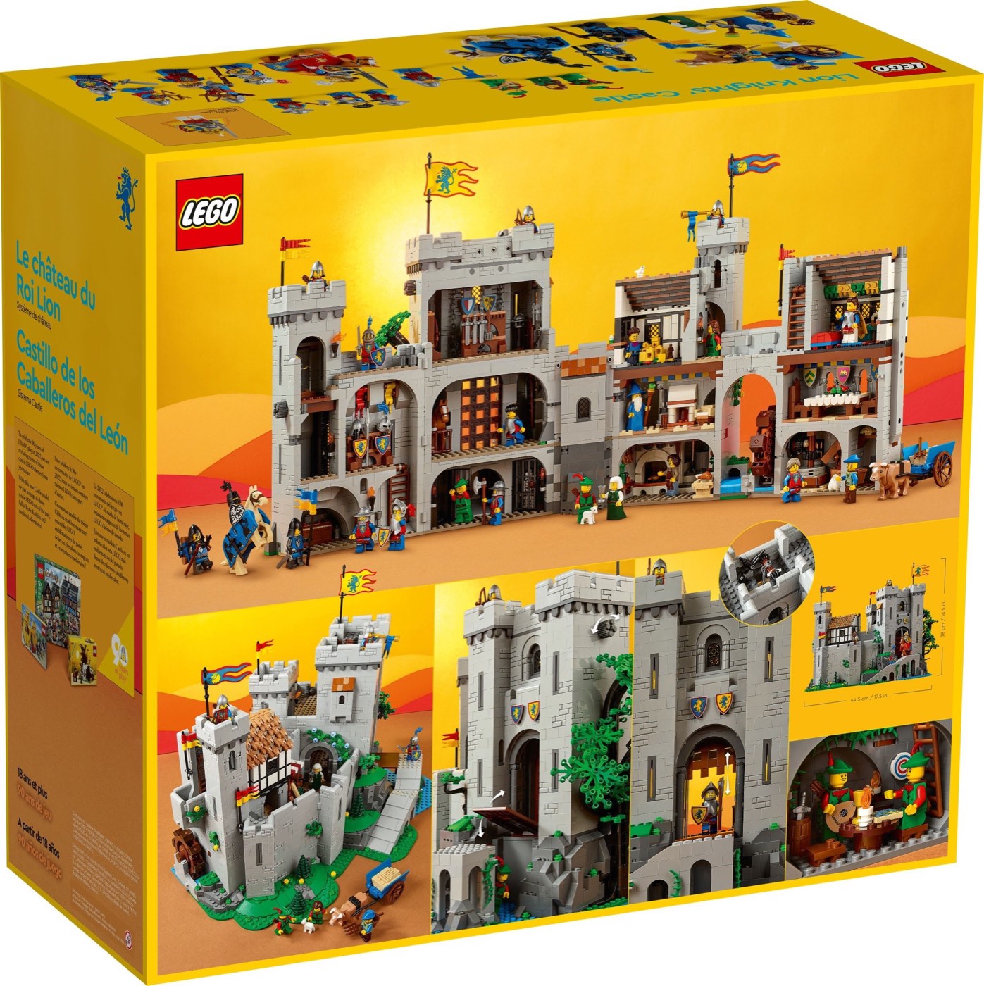 Rear of the LEGO Lion Knights' Castle 10305 box showing the castle opened out to reveal the kitchen, great hall and armoury interiors
