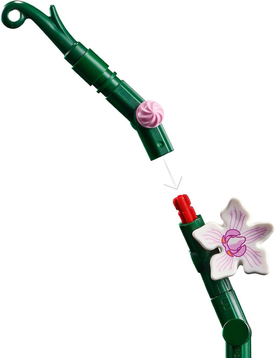 Detail of a LEGO Orchid 10311 stem being assembled, showing the pink knob gear bud and a printed flower element on the green bar