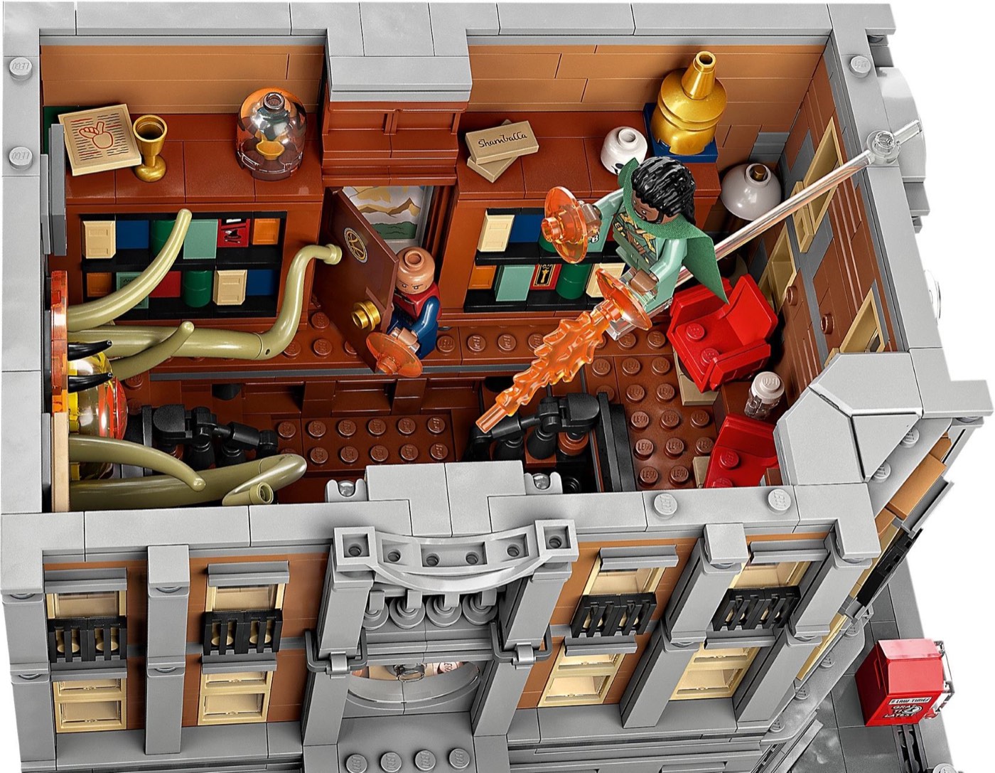 Interior of a LEGO Sanctum Sanctorum 76218 floor seen from above, with bookshelves, artefacts, Wong and Spider-Man among the tentacles