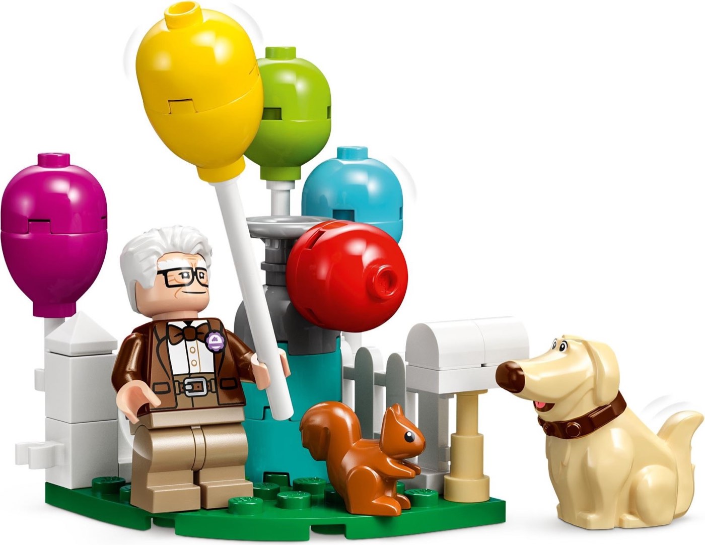 Carl Fredricksen holding balloons beside the mailbox, white picket fence, squirrel and Dug from LEGO 'Up' House 43217